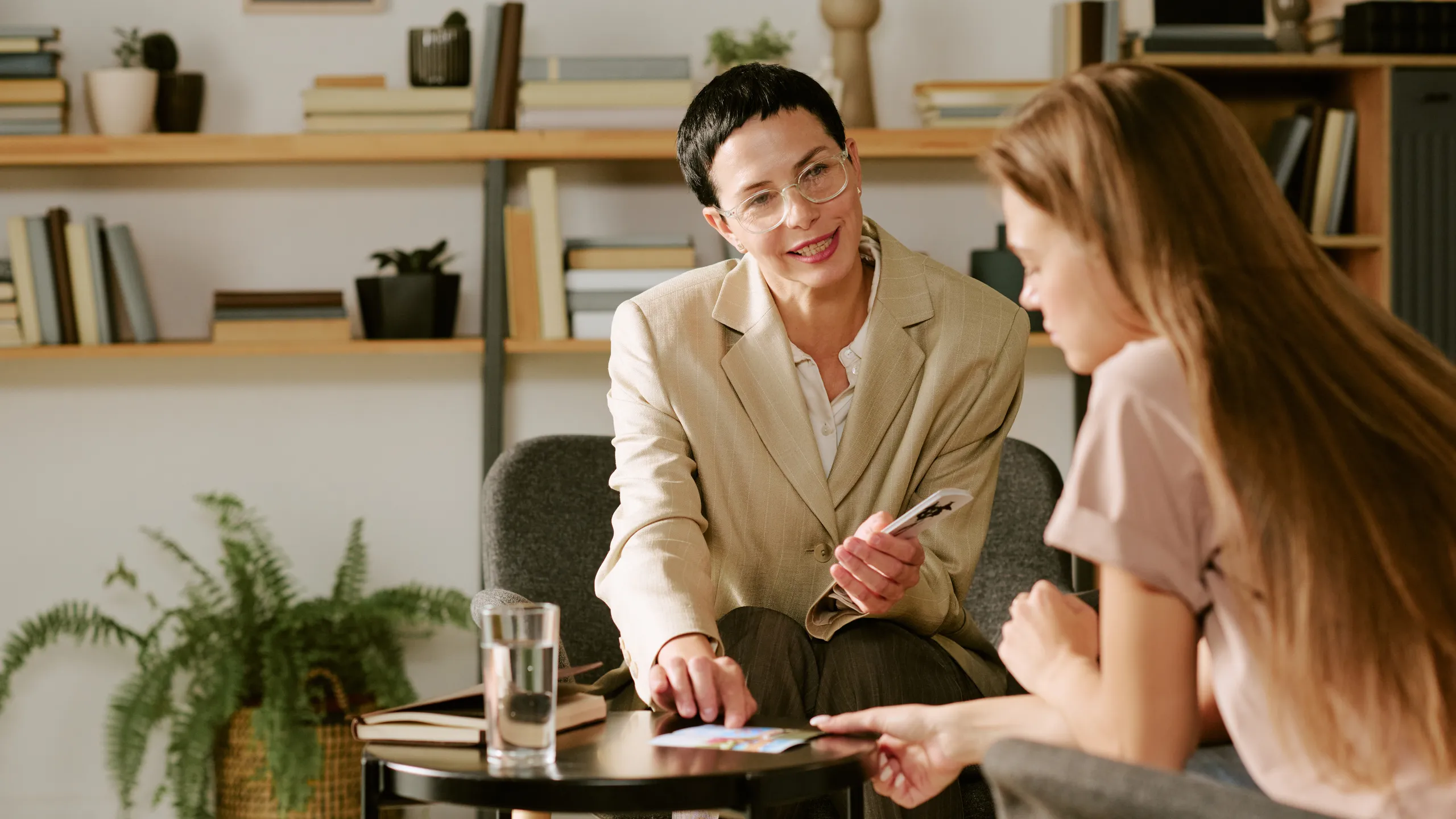 Middle Aged Caucasian Woman Psychologist Counseling Young Adult Caucasian Woman