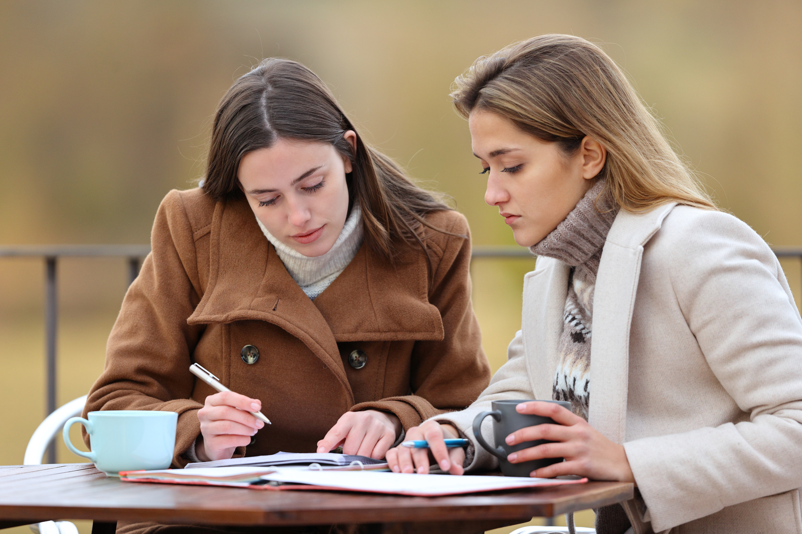 High school seniors working on college applications over winter break