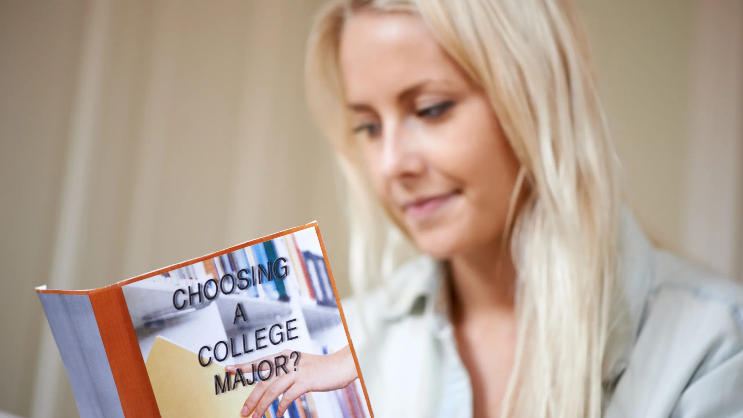 Education, university and woman with book for studying, choice or research, check or future planning. College, decision or female student with information, pamphlet or career, guide or upskill option