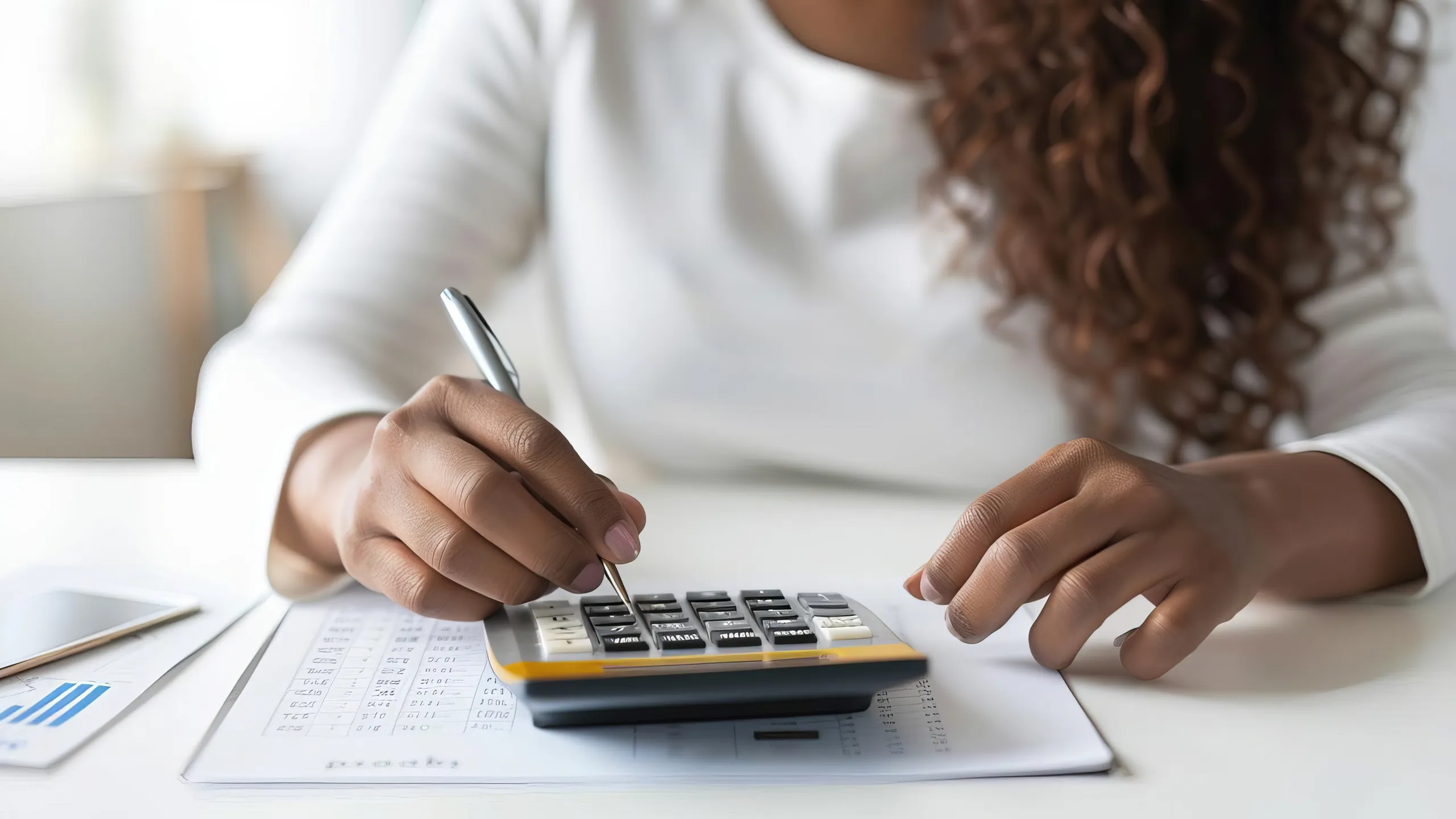 Woman calculating debt-to-income ratio, financial planning concept