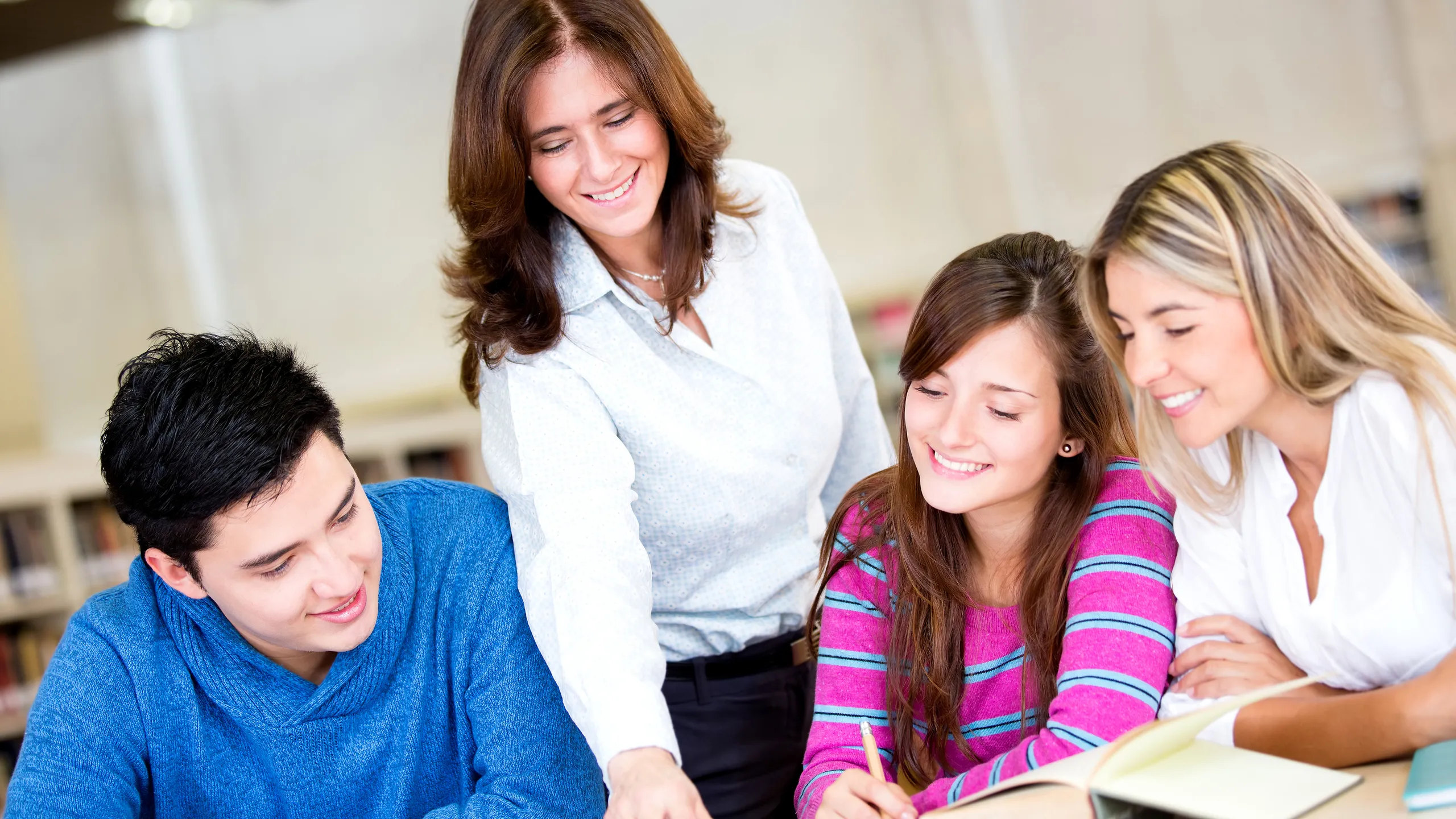group of students with advisor