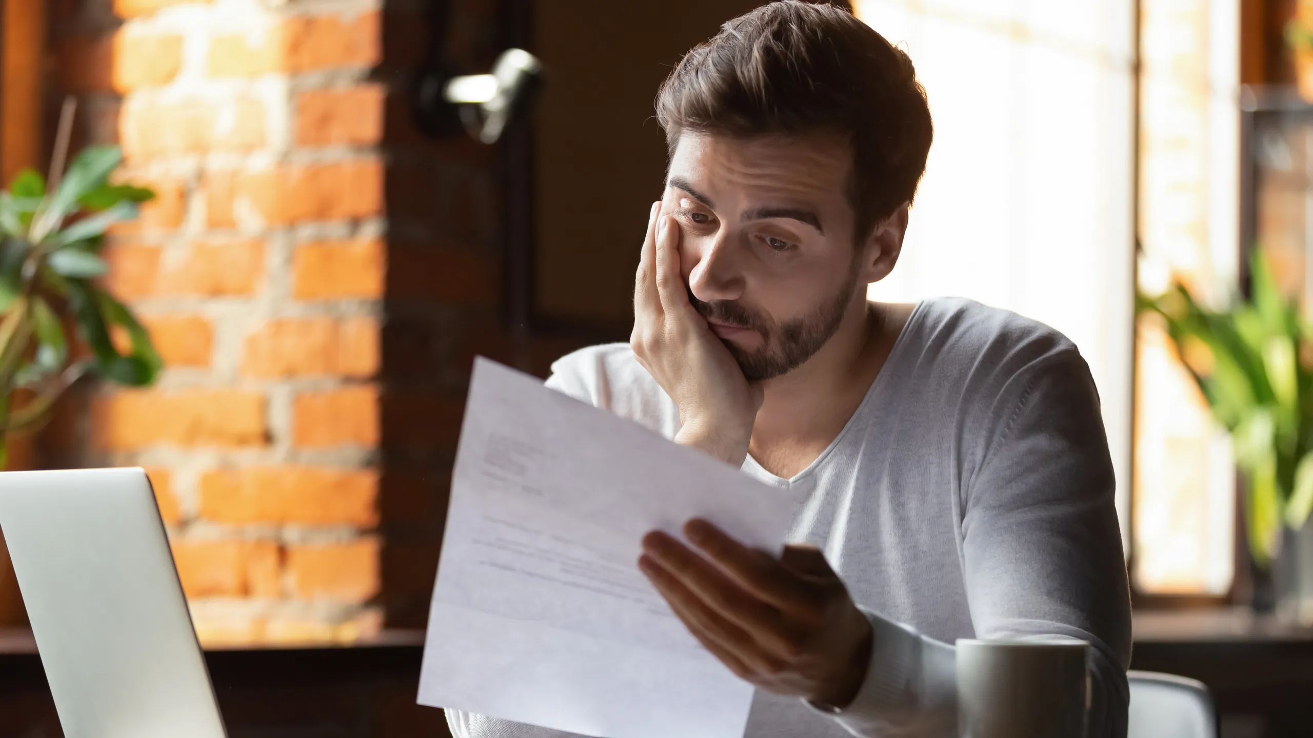 man reading a letter
