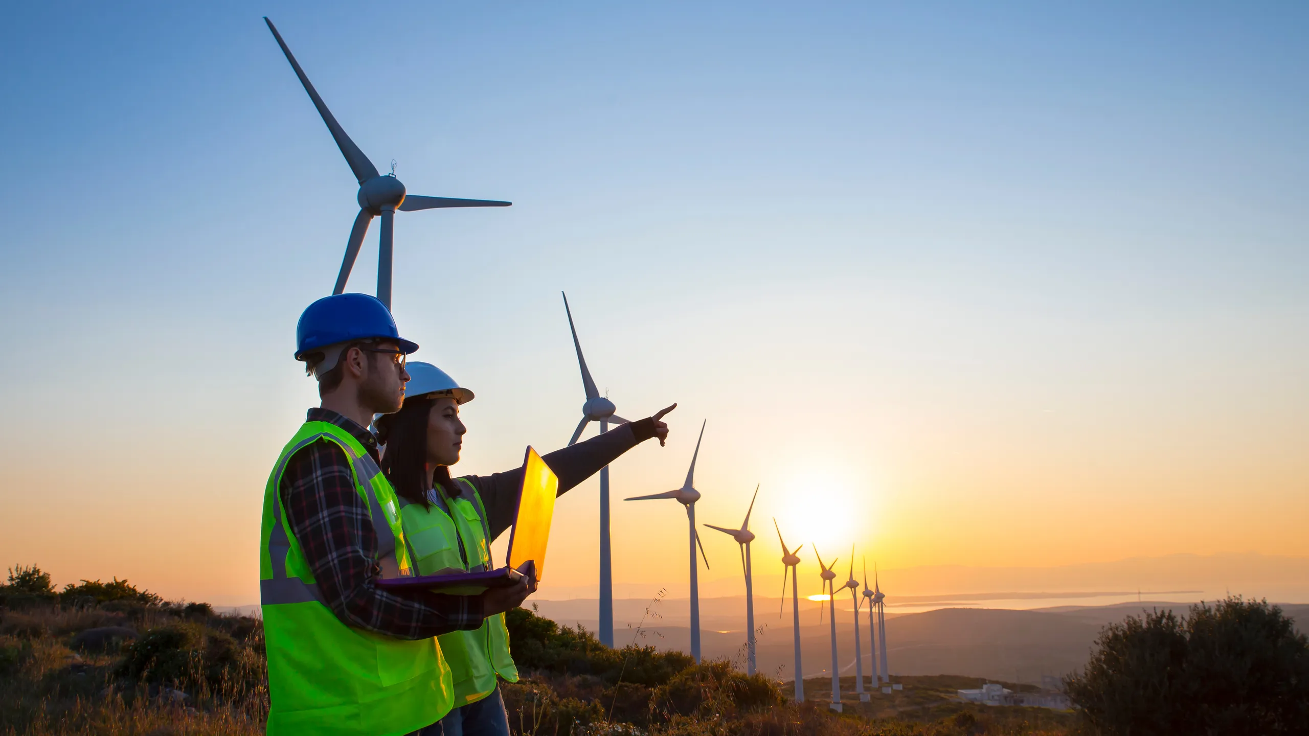 engineering team working in wind turbine farm