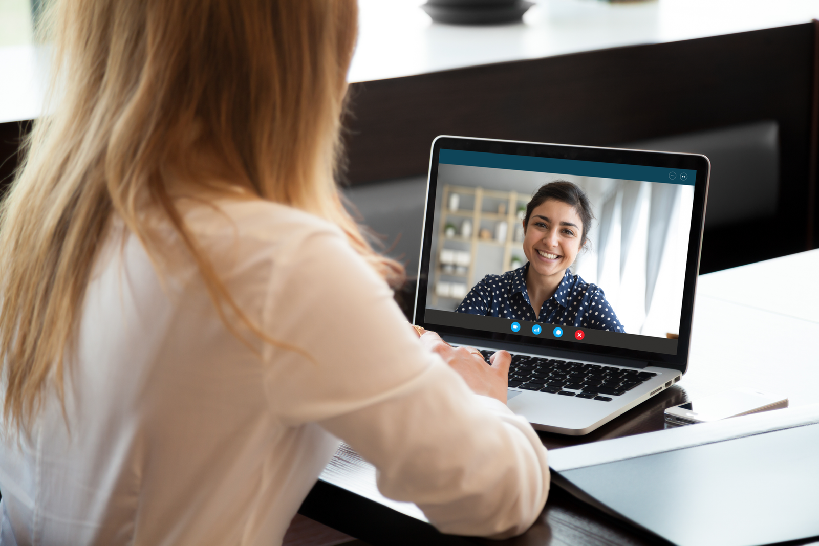 Laptop,Screen,View,Over,Female,Shoulder,,Businesswomen,Working,From,Home