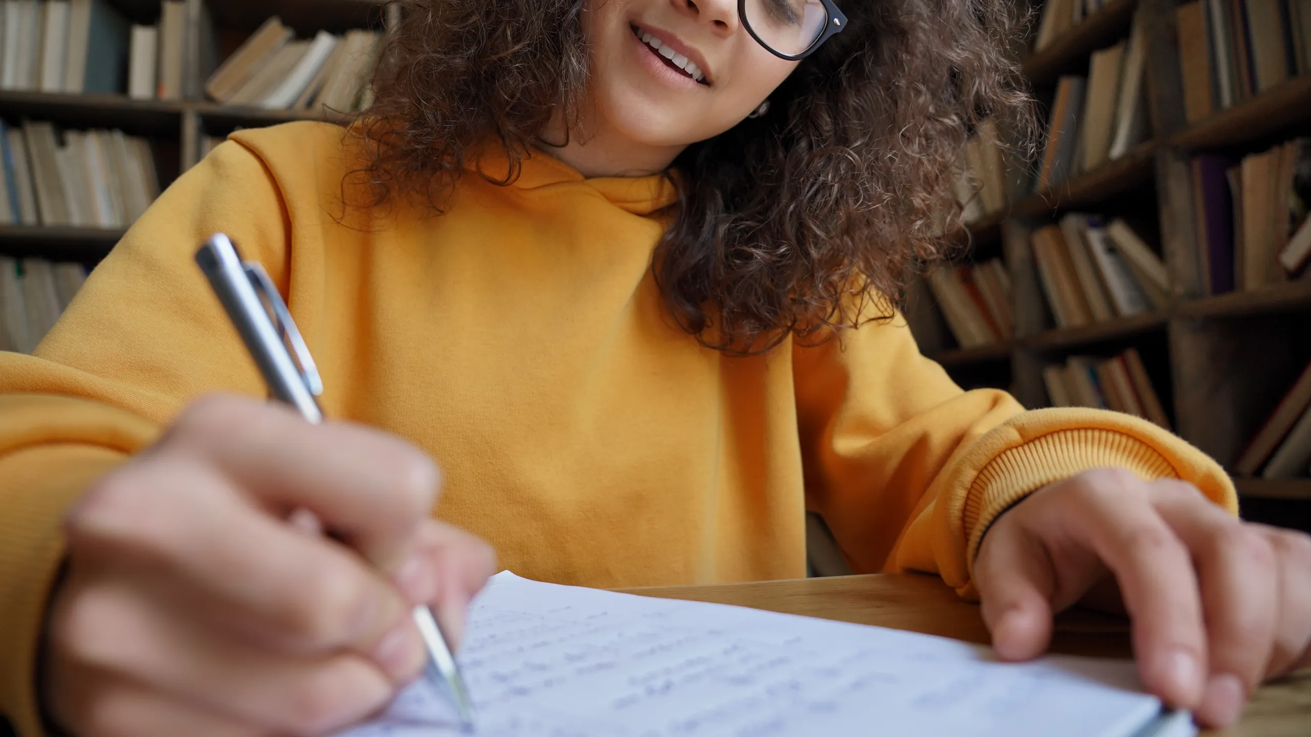 student in library