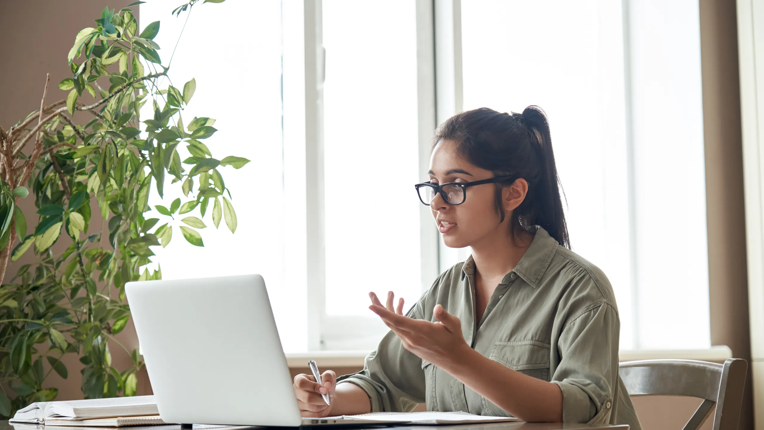 Indian,Woman,Online,Tutor,Remote,Teacher,Wearing,Glasses,Speaking,To