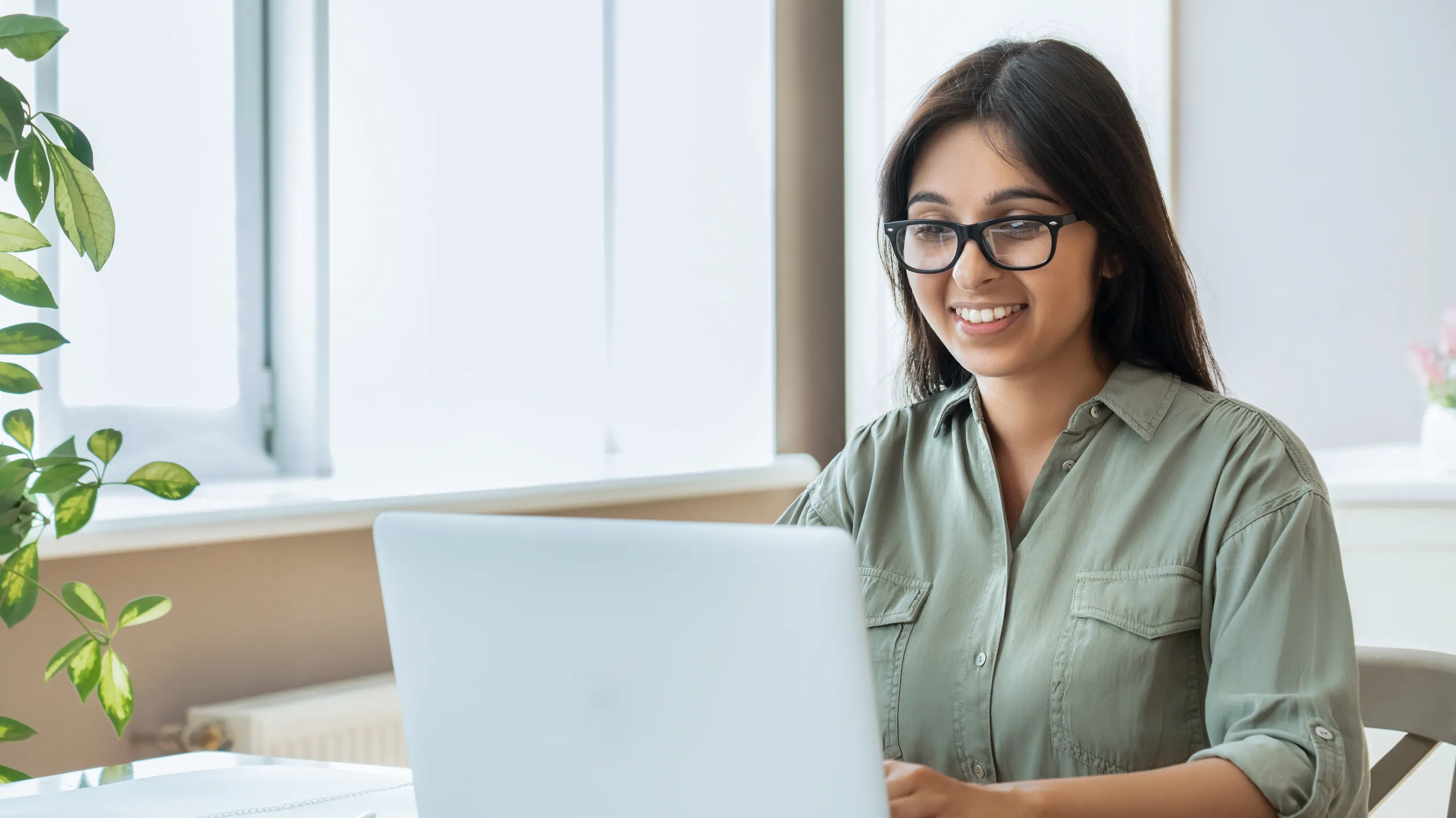young woman working on laptop