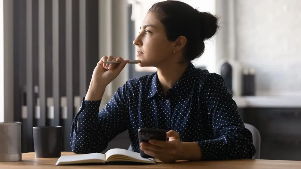 student studying with iphone