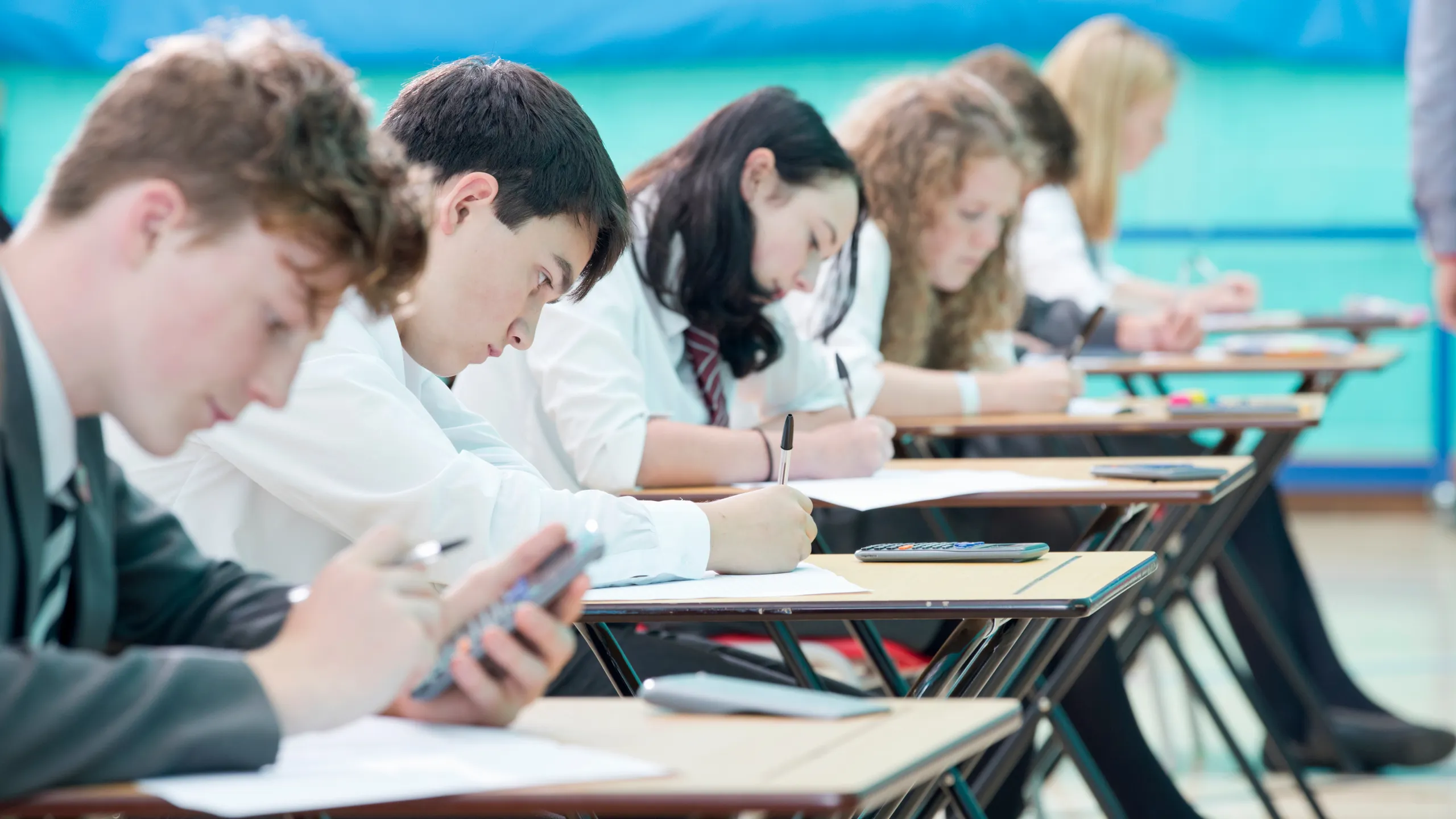 focused students taking exam