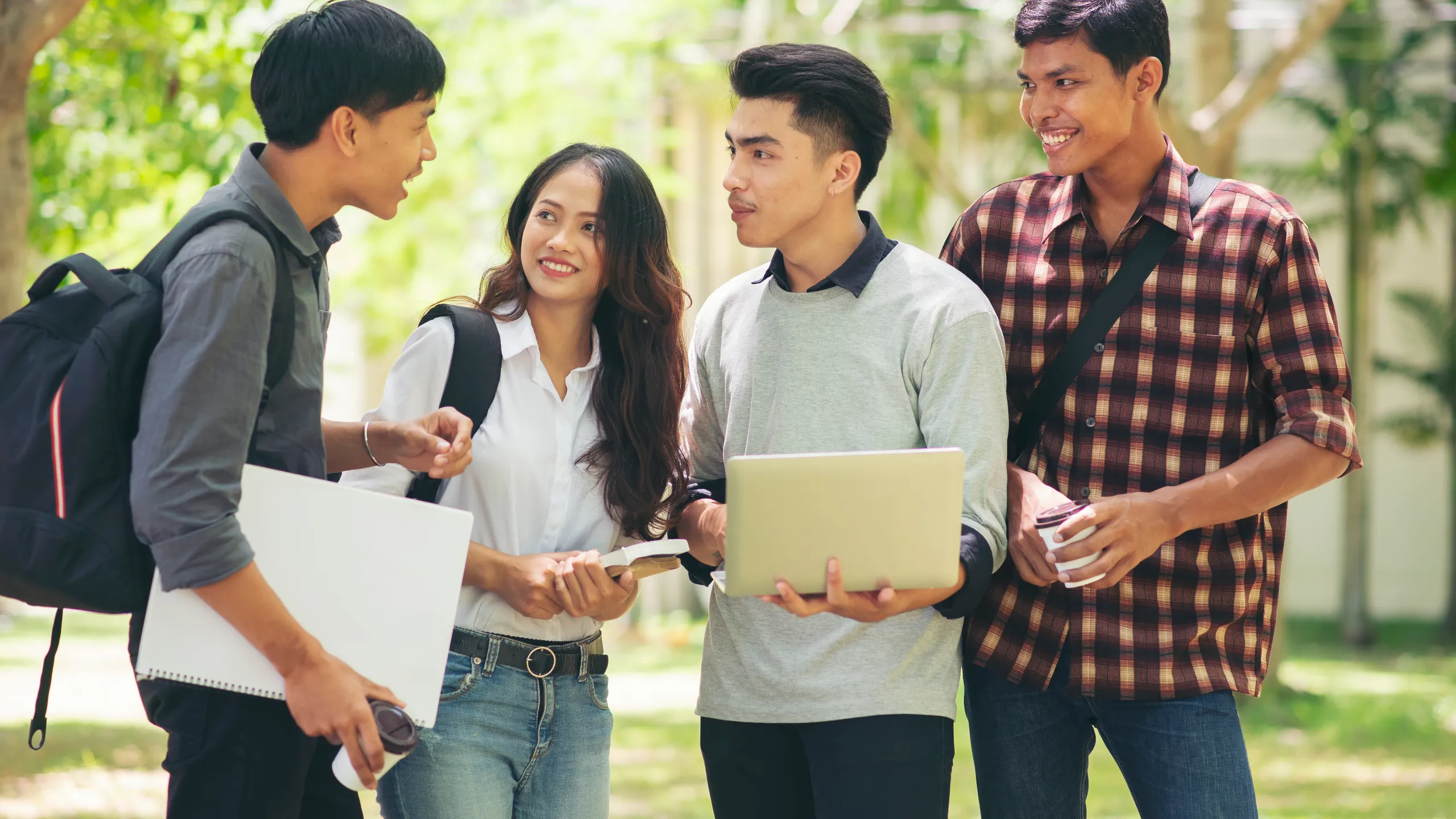 students talking outside