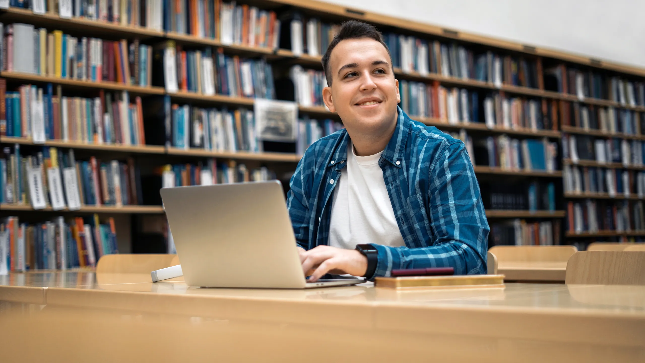 student working at library