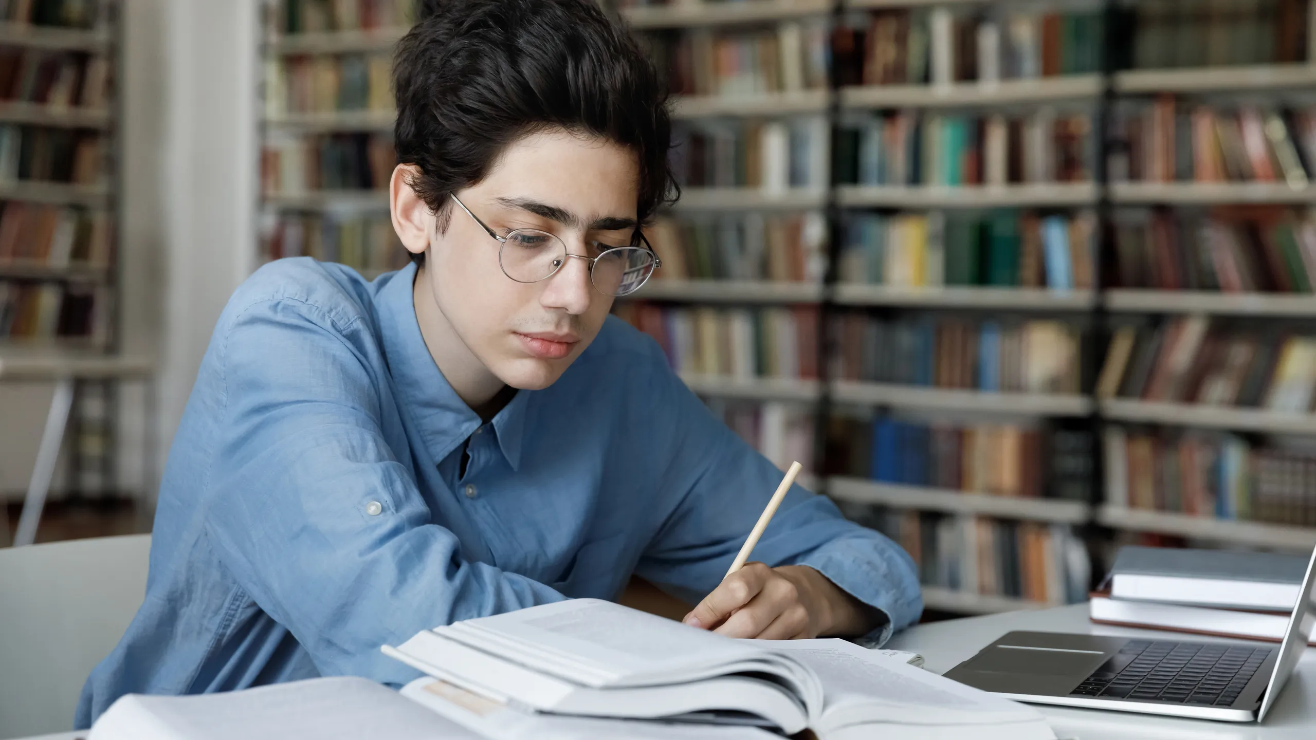 student working in library