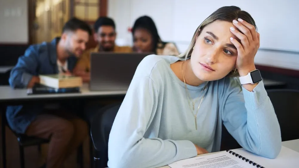student thinking about college rejection