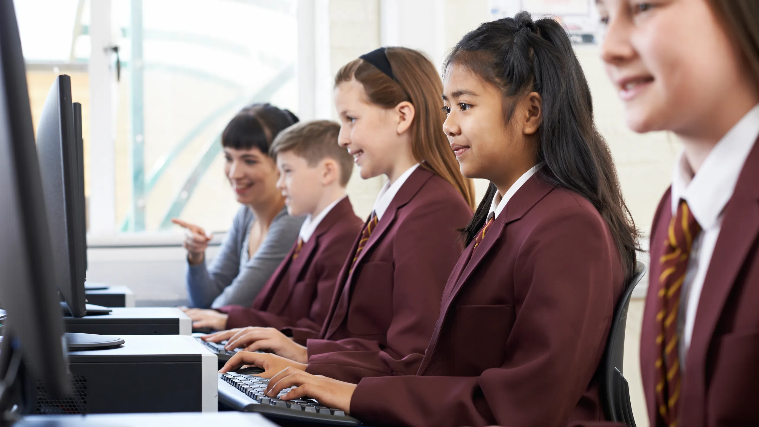 students in classroom with teacher