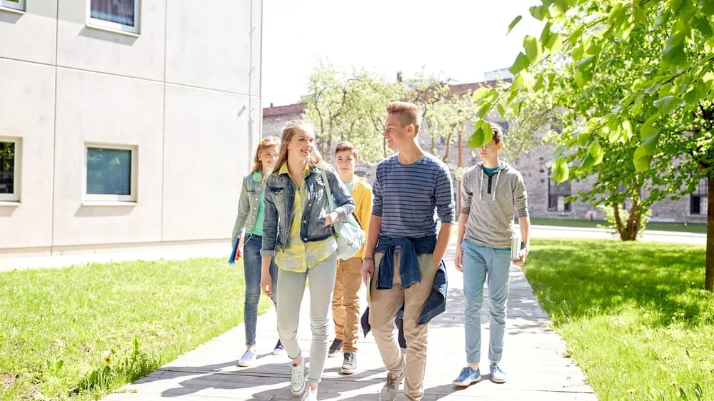 students walking on highschool campus