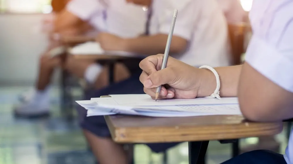 students doing an exam in class