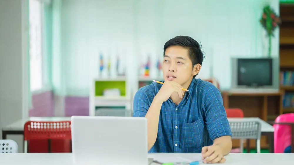 person thinking and working