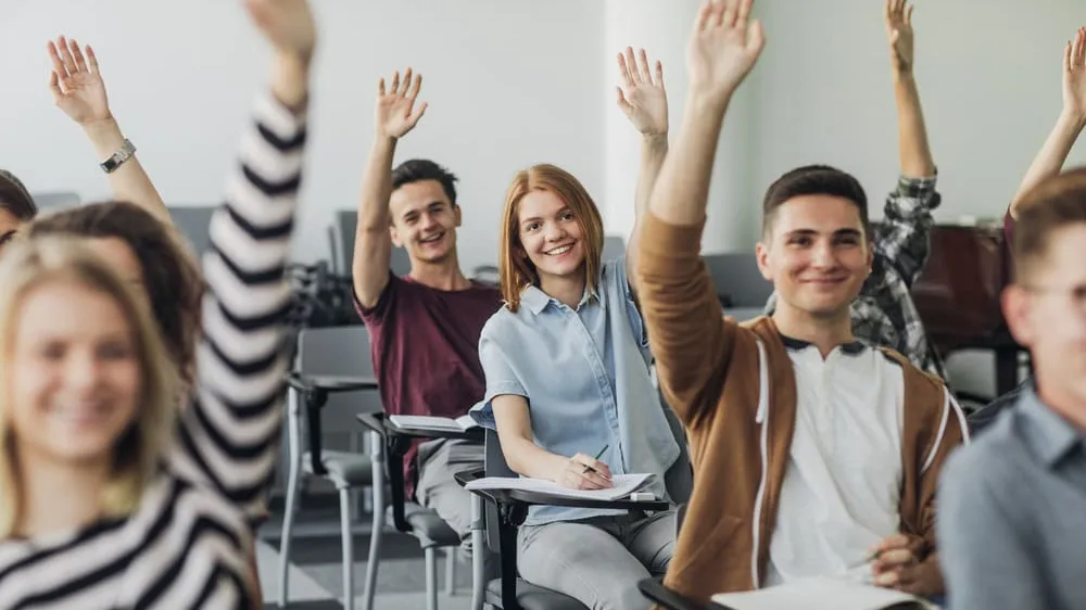 Students raising hands