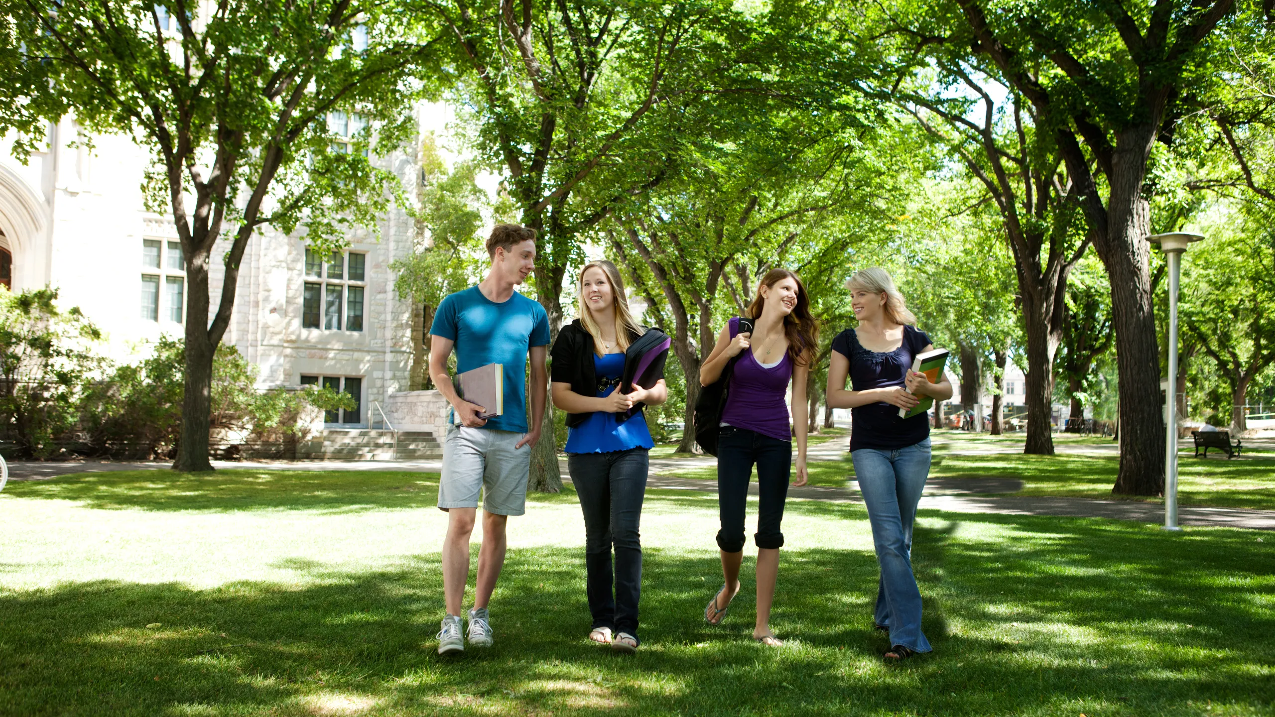 students walking through campus